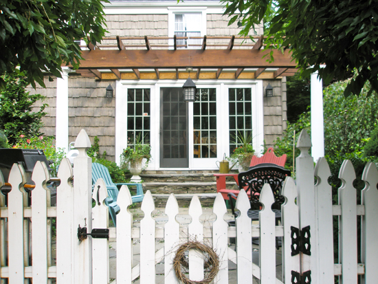 Garden Pergola Provides Shade Over Patio Front View